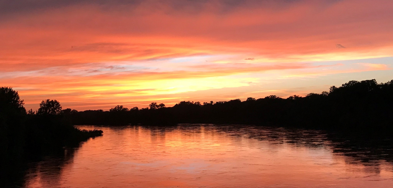 Sunset on the Des Moines River in Eldon Iowa

